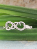0.08 Carat (ctw) Round Diamond Ladies Infinity Design Engagement Promise Ring Sterling Silver