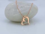 0.02 Carat (Ctw) Round White Diamond Ladies Heart Pendant (Gold Chain Included) 18K Rose Gold