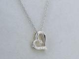 0.02 Carat (Ctw) Round White Diamond Ladies Heart Pendant (Silver Chain Included) Sterling Silver
