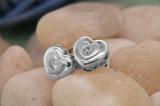 0.08 Carat (ctw) Round White Diamond Ladies Heart Shaped Stud Earrings 10K White Gold
