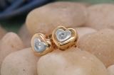 0.08 Carat (ctw) Round White Diamond Ladies Heart Shaped Stud Earrings 10K Yellow Gold