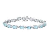 5X7 mm Oval Blue Topaz & Round White Diamond Ladies Fashion Tennis Bracelet Sterling Silver