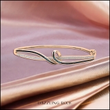 0.15 Carat (ctw) Round Blue & White Diamond Twisted Bangle Bracelet for Women in 14K Rose Gold
