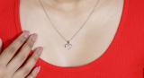 0.11 Carat (ctw) Round White Diamond Ladies Solitaire Heart Pendant Sterling Silver