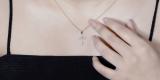0.10 Carat (ctw) Round White Diamond Ladies Cross Pendant 1/10 CT 10K Yellow Gold