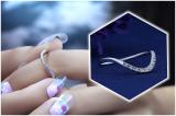 0.05 Carat (ctw) 0.05 Carat (ctw) Round White Diamond Curved Wedding Band | 925 Sterling Silver