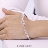 Round White Diamond Infinity Knot Bangle Bracelet for Her (Diameter 2.75 inch 0.25 ctw Color I-J Clarity I2-I3) in 925 Sterling Silver