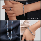 6X4 mm Oval Blue Topaz & 2.3 mm Round White Topaz Ladies Three Stone Bracelet Sterling Silver