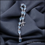6X4 mm Oval Blue Topaz & 2.3 mm Round White Topaz Ladies Three Stone Bracelet Sterling Silver