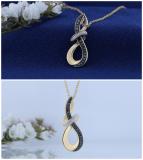 0.20 Carat (ctw) Round Black & White Diamond Abstract Infinity Twist Pendant for Women 1/5 CT in 10K Yellow Gold