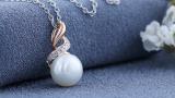 Round 9mm Cultured Freshwater Pearl and White Diamond Accent Crossover Pendant with 18 inch Silver Chain for Women in 14K Rose Gold