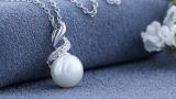 Round 9mm Cultured Freshwater Pearl and White Diamond Accent Crossover Pendant with 18 inch Silver Chain for Women in 18K White Gold