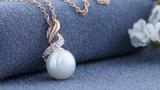 Round 9mm Cultured Freshwater Pearl and White Diamond Accent Crossover Pendant with 18 inch Gold Chain for Women in 18K Rose Gold
