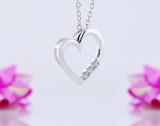 0.15 Carat (ctw) 14k White Gold 3 Stone Diamond Heart Pendant