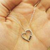 0.15 Carat (ctw) 10k White Gold Round Black Diamond Ladies Heart Pendant
