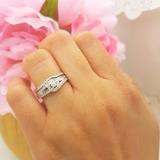 0.50 Carat (ctw) 10K White Gold Round Baguette Diamond Ladies Swirl Engagement Matching Band Halo Style Bridal Ring Set
