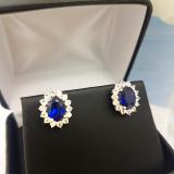 Sterling Silver 8X6 MM Oval Cut Lab Created Blue & Round White Sapphire Ladies Fashion Stud Earrings