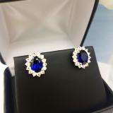 Sterling Silver 8X6 MM Oval Cut Lab Created Blue & Round White Sapphire Ladies Fashion Stud Earrings