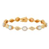 6X4 mm Oval Lab Created Opal Ladies Bracelet with Natural Diamond Accent Yellow Gold Plated Silver
