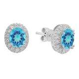 Sterling Silver Oval Cut Blue Topaz & Round White Sapphire Ladies Halo Style Fashion Stud Earrings