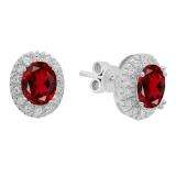 Sterling Silver Oval Cut Garnet & Round White Sapphire Ladies Halo Style Fashion Stud Earrings